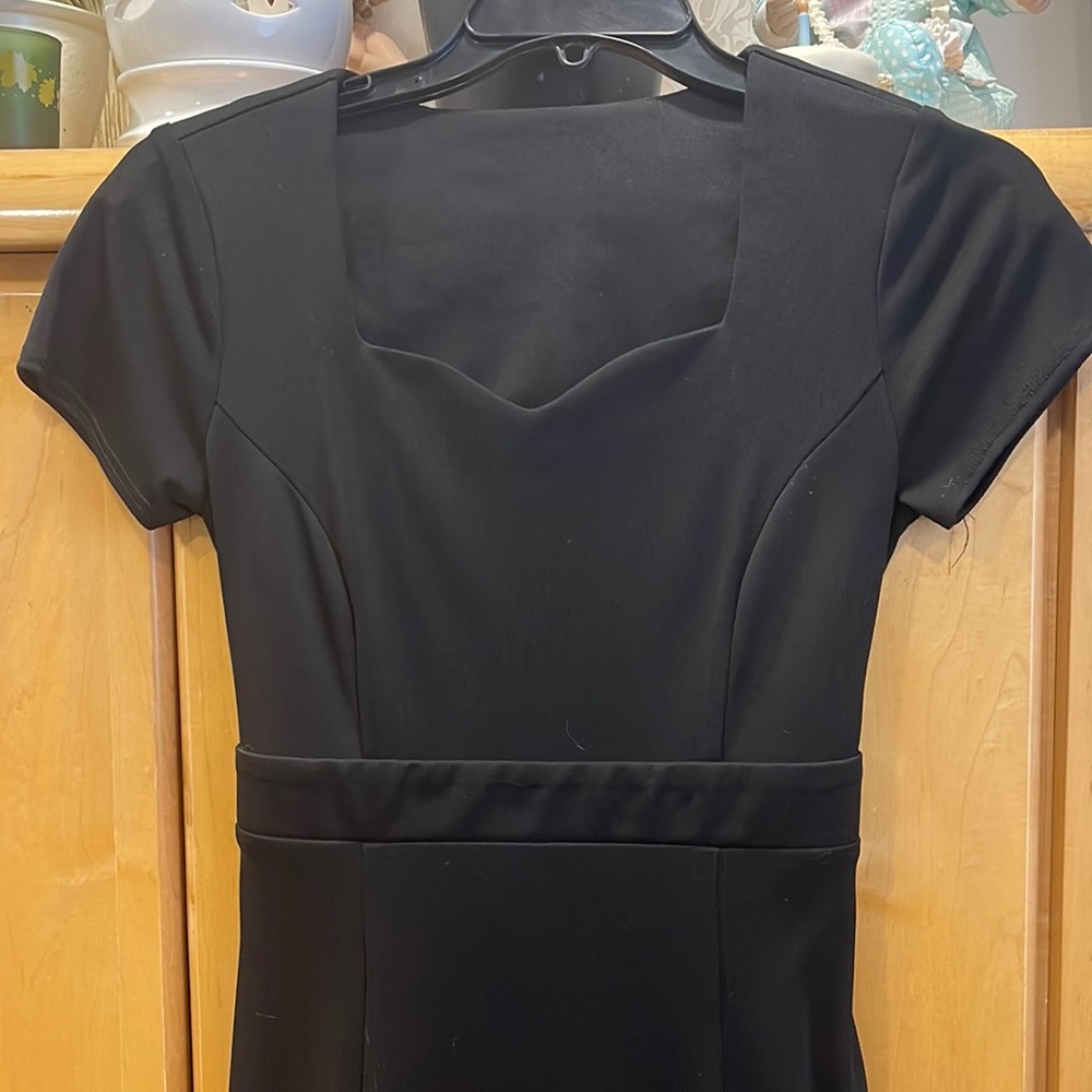 My daughter used for chorus.   It was never hemmed